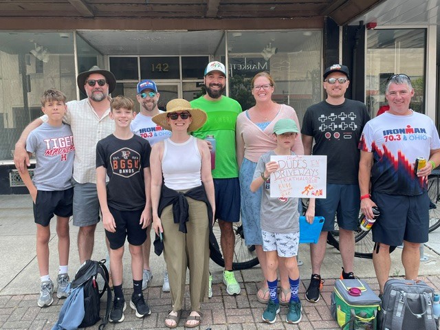 Friends and family cheering during Ironman 70.3 Ohio