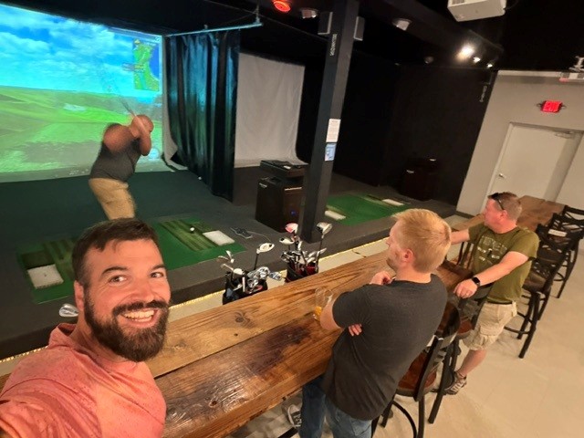 Dudes hanging out at Coastal Swing